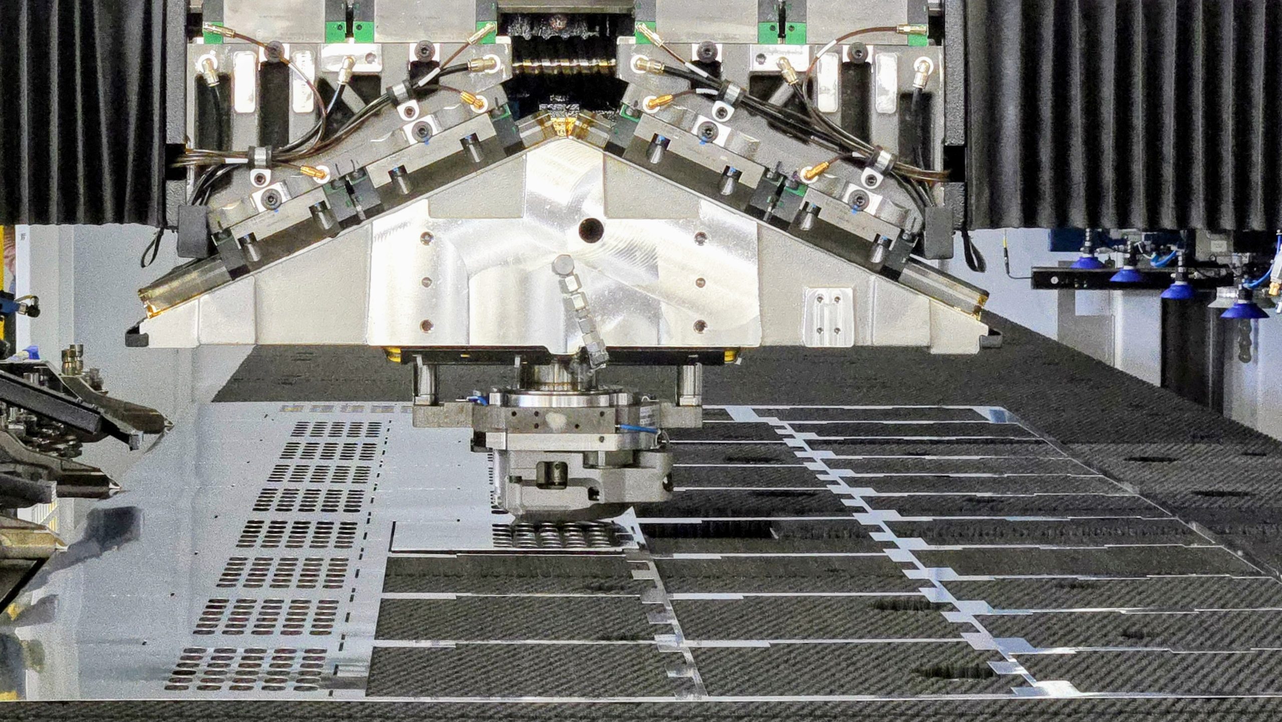 Industrial robot operating inside safety cage